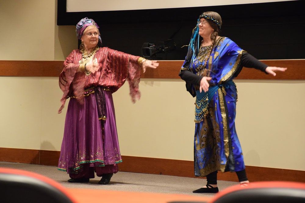 Image of 2 LLP Belly Dancing participants in the middle of a dance